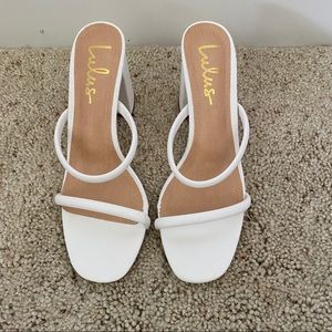 Lulu’s white heeled sandals